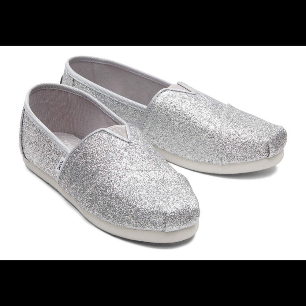 Toms Classic Slip Ons.